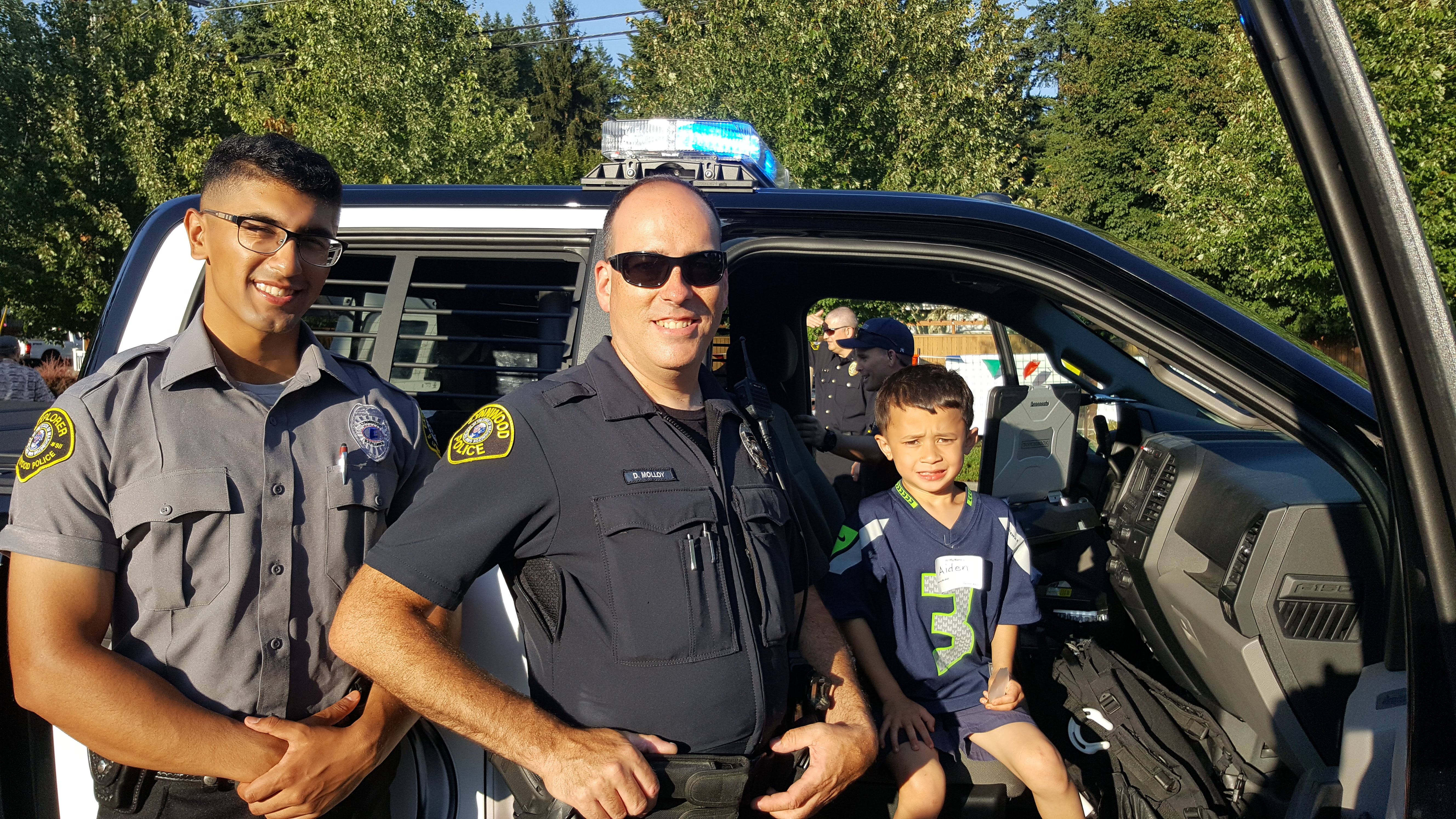 Officer and Explorer at 2019 National Night Out