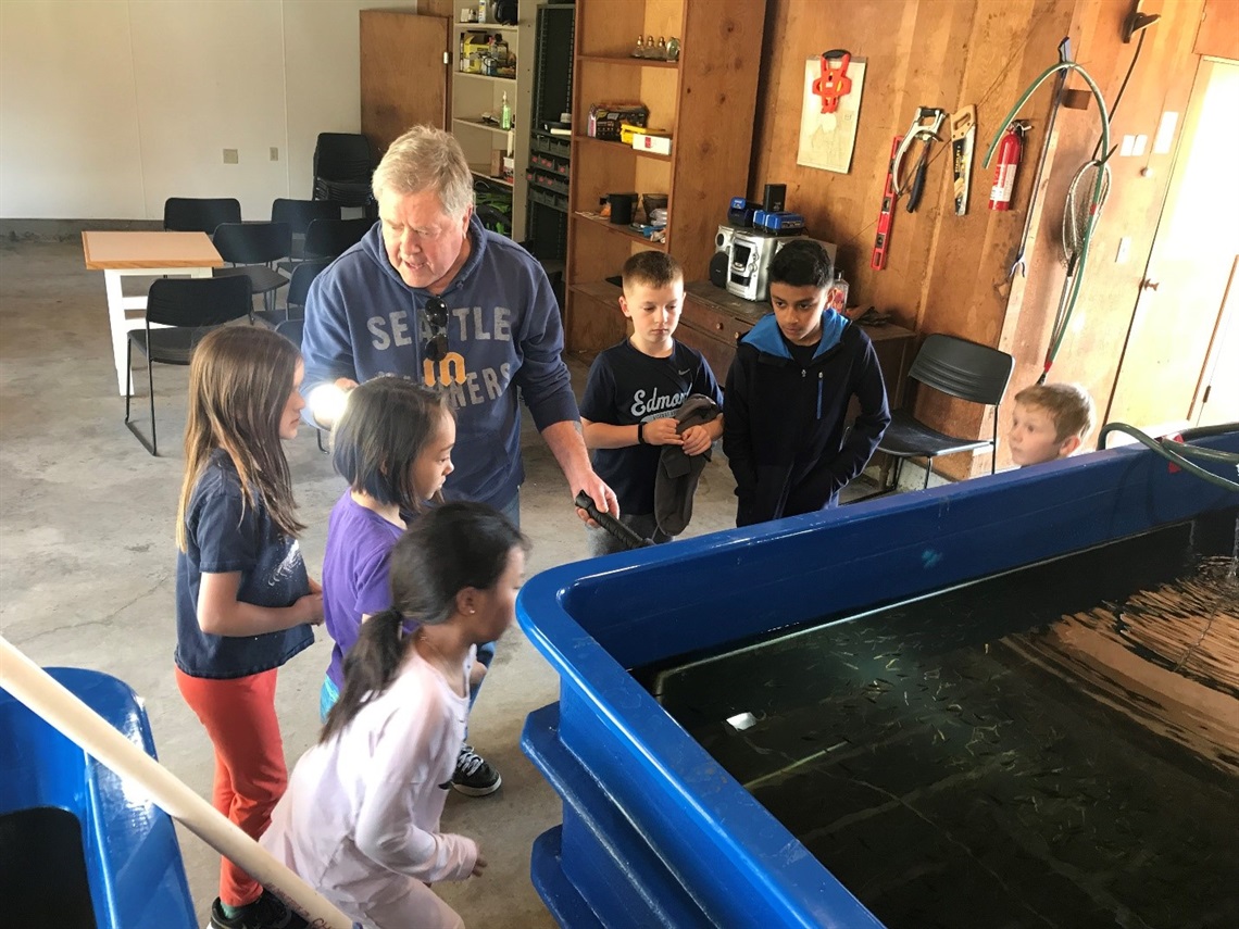 Bruce teaching kids about salmon 
